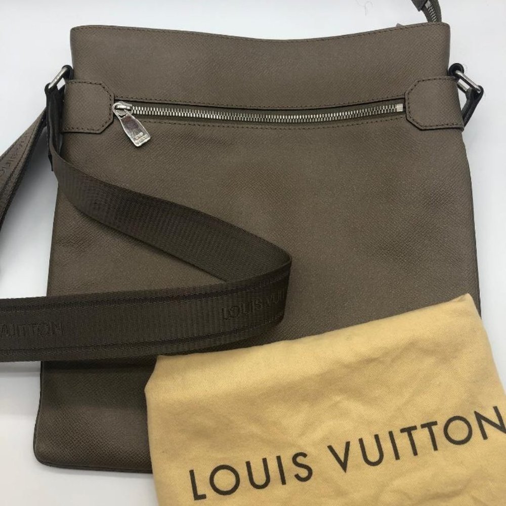 Authentic Louis Vuitton Mens Taiga Collection bag